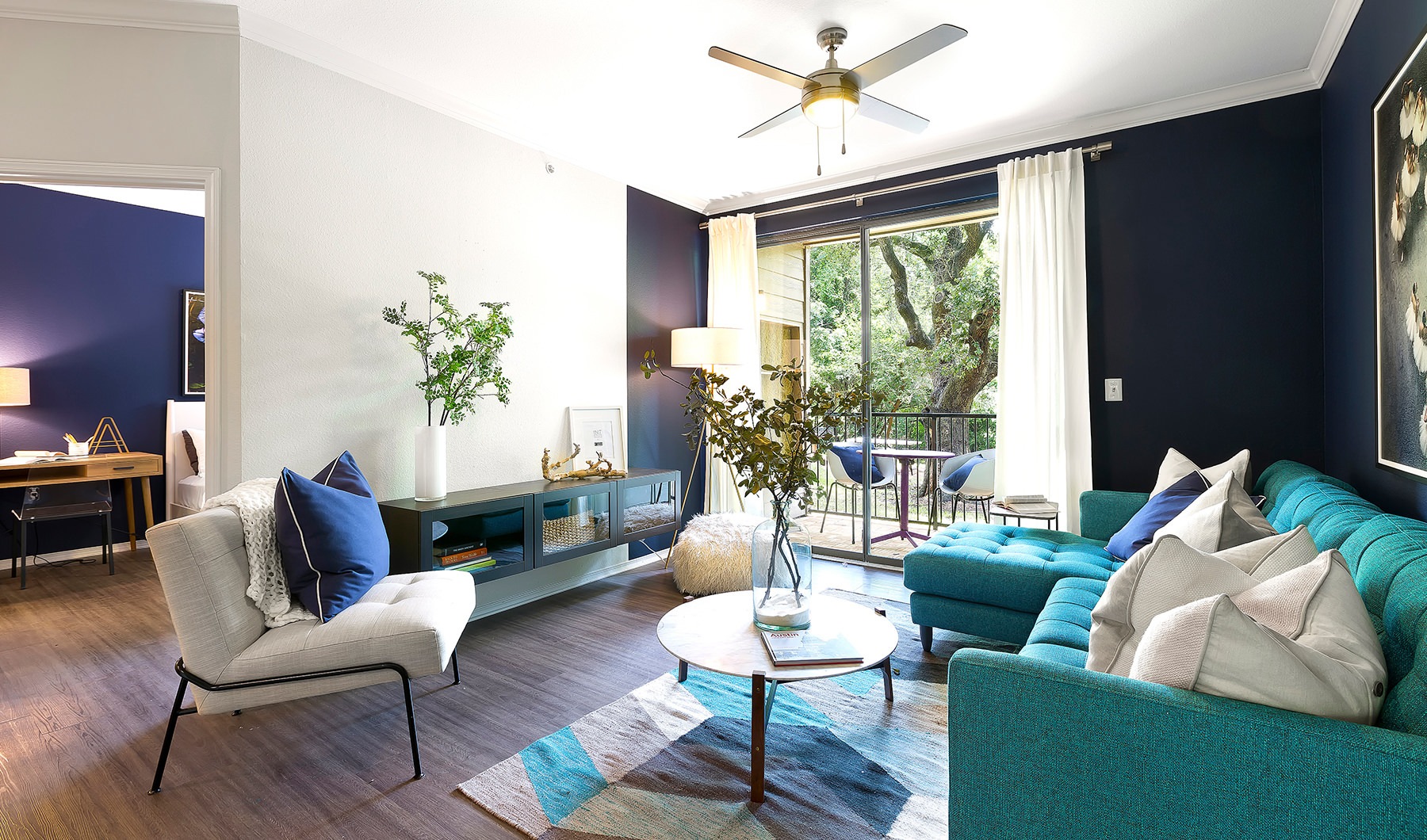 Living room with balcony at Folio North Austin apartments Living room with balcony at Folio North Austin apartments